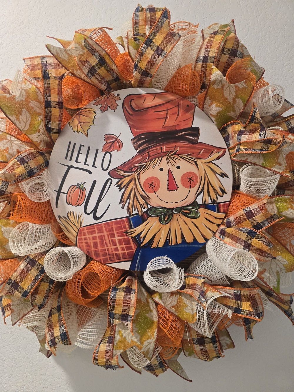 W153 Hello Fall Scarecrow Wreath
Handmade fall wreath featuring a fun scarecrow